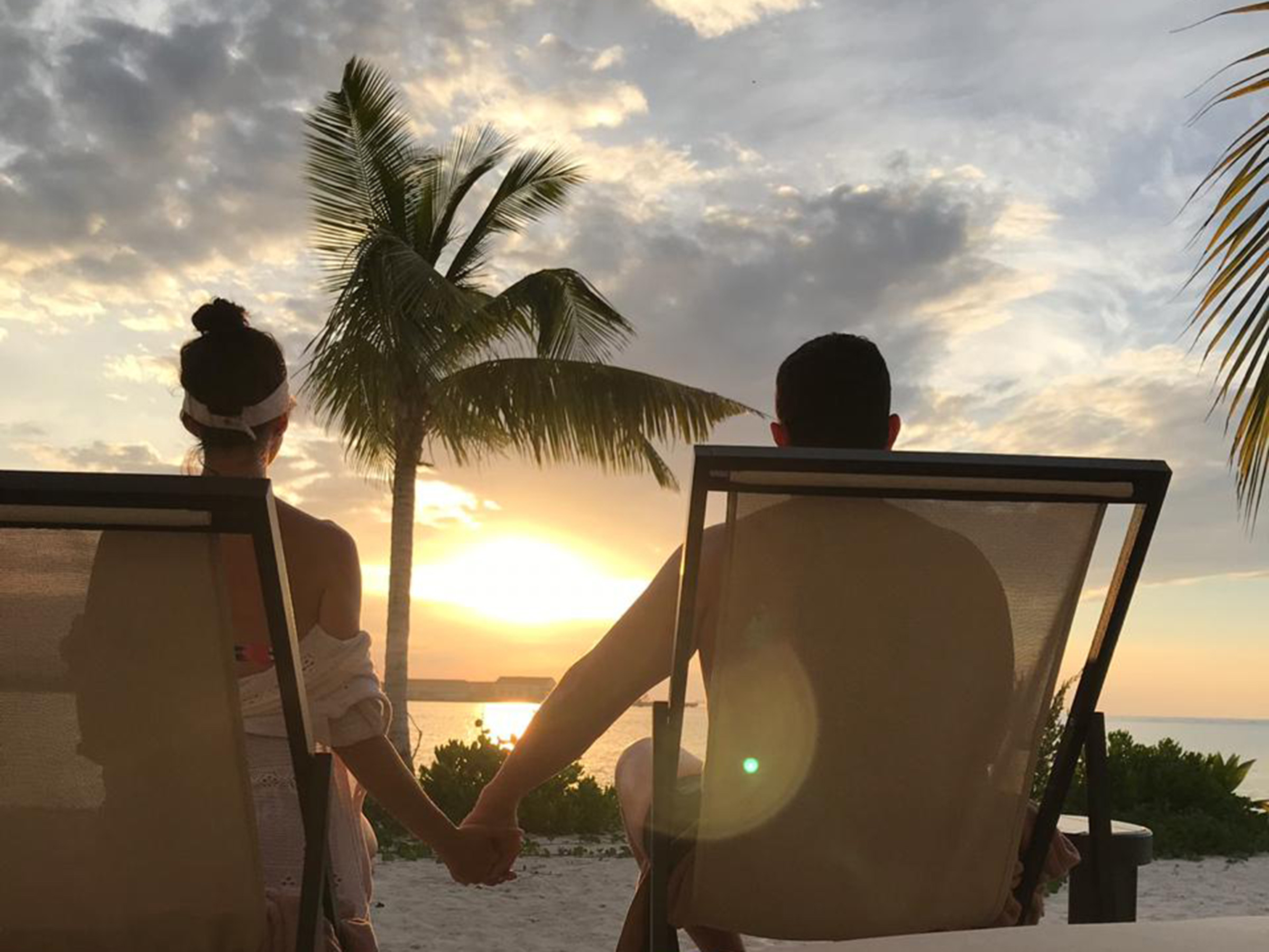 Nathalia and her husband enjoying the Jamaican sunset