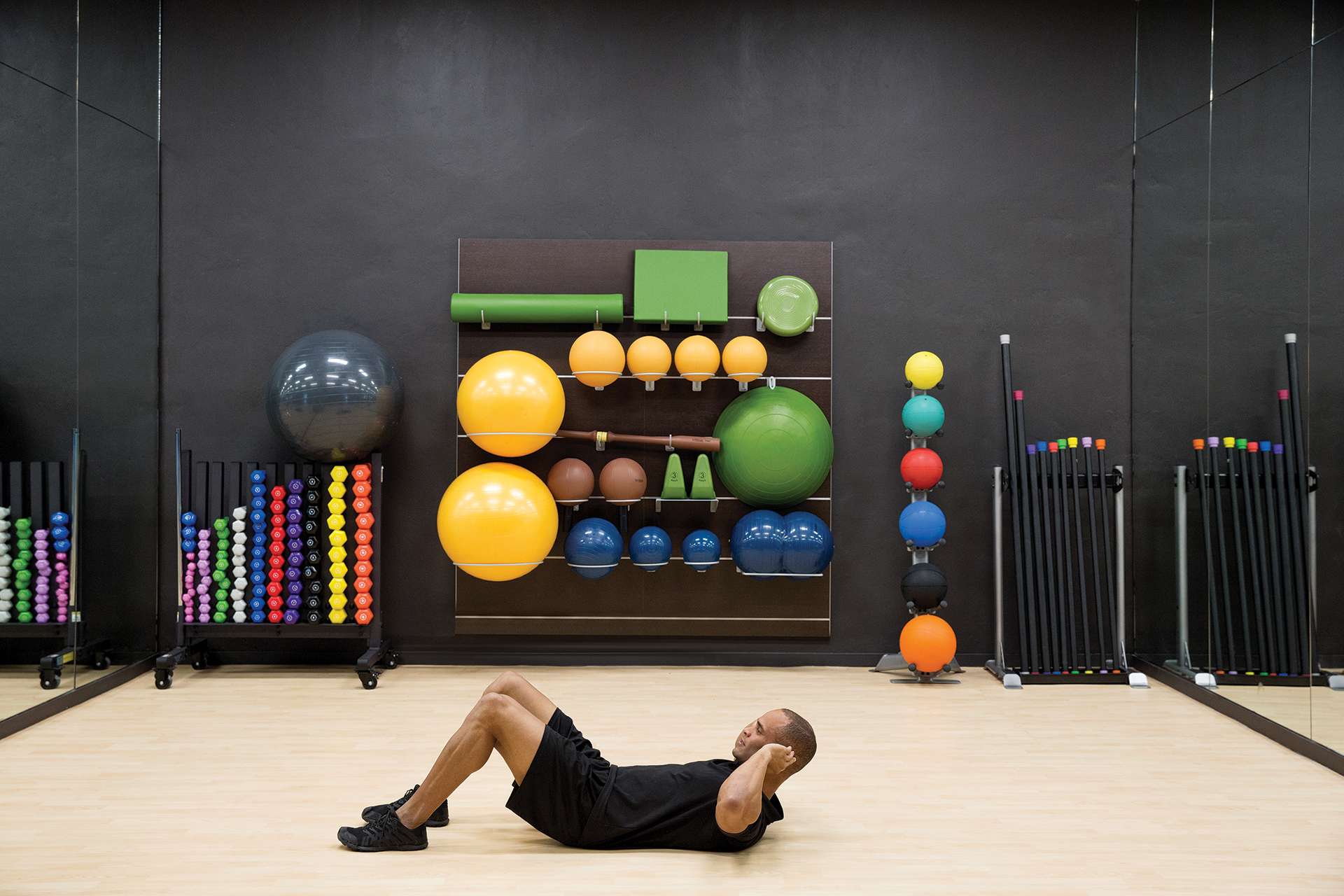 Man working out at the fitness center in Excellence Carmen Punta Cana