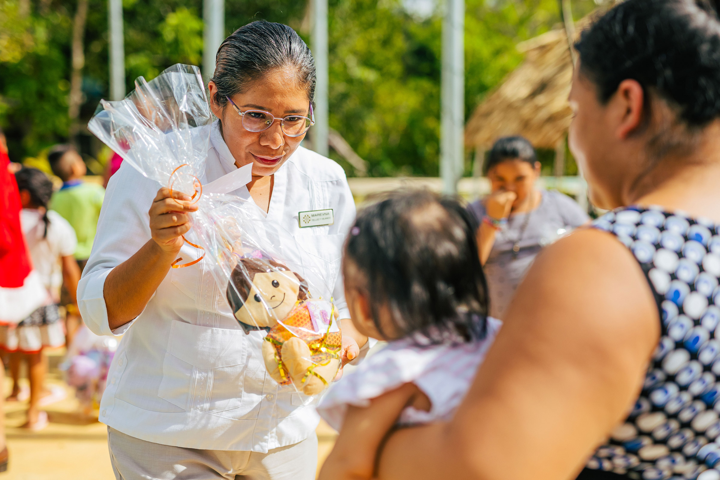 Donating a toy and making a child happy with Excellence Resorts