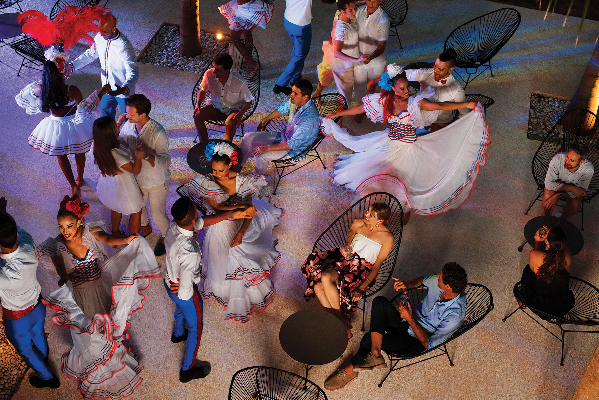 Couple experiencing the national dances of the Dominican Republic